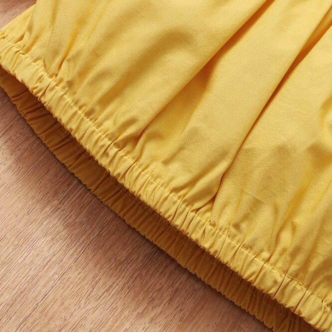 ⁦طقم بناتي جذاب مكون من قطعتين بلوزة بأكمام قصيرة منفوخة وشورت مزين بفيونكة نمط الليمون⁩ - الصورة ⁦5⁩