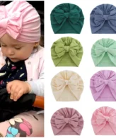 قبعات أنيقة قابلة للتمدد مزينة بفيونكة