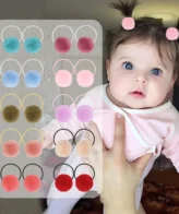 زوج من رباط الشعر انيق على شكل كرة برباط مطاطي