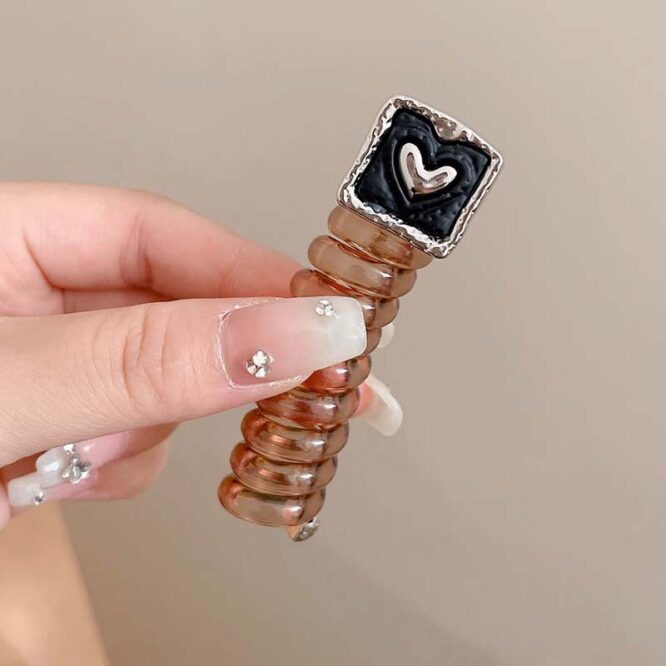 ⁦ربطة شعر حلزونية  بتصميم عصري أنيق⁩ - الصورة ⁦2⁩